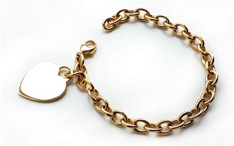 Tiffany & Co. 18k Gold Heart Tag Charm Bracelet, 7½ inches - Bloomsbury Manor Ltd