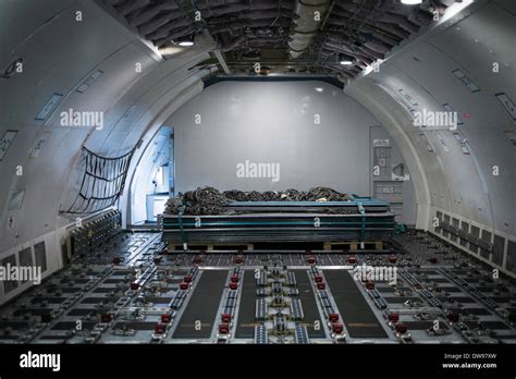 view of cargo airplane interior with stack pallets Stock Photo - Alamy