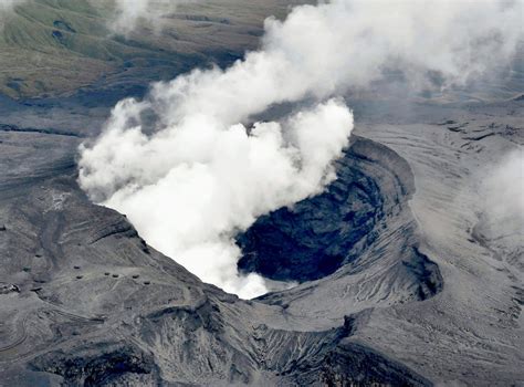 An aerial view shows the eruption of Mount Aso in Aso - Reaching Japan