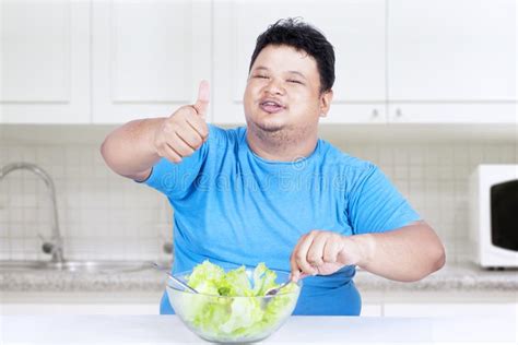 Fat man eating salad 3 stock photo. Image of adult, happy - 41583054