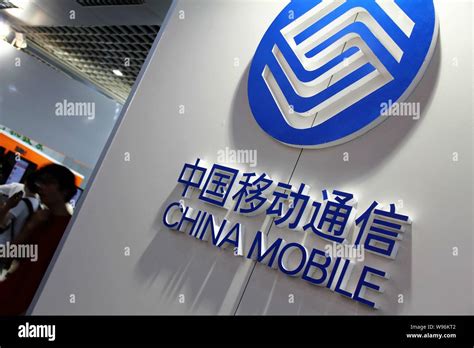 --File--View of the logo of China Mobile during a fair in Beijing ...