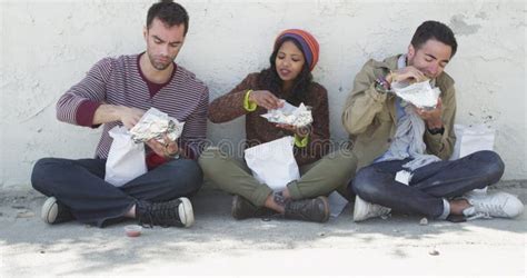 Group of Friends Eating Fast Food Together Stock Footage - Video of ...