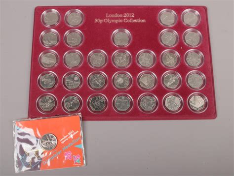 A London 2012 Olympic 50 pence collection, a full set of 29 coins to ...