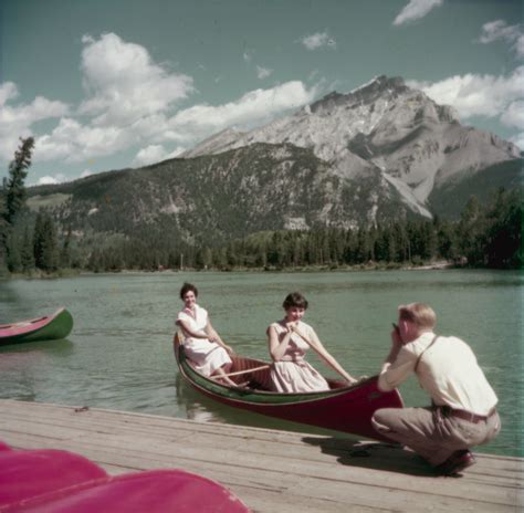 Two women canoeing on Bow River with Cascade Mountain in t… | Flickr