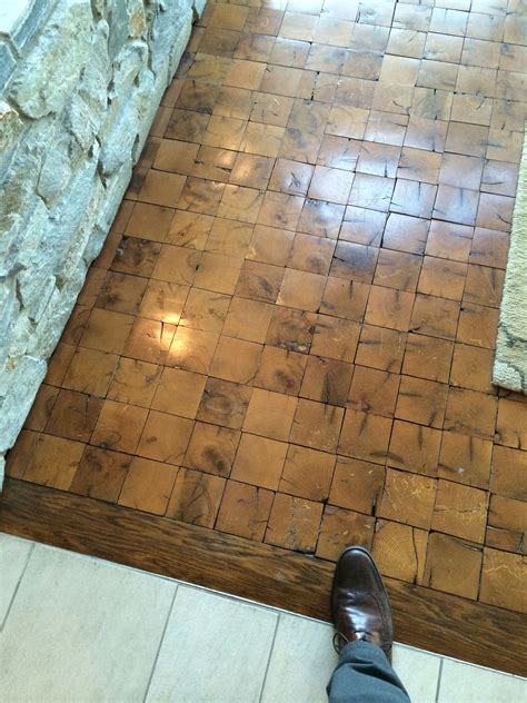 End grain wood tile floor, has a nice sense of depth to it. | Flooring, End grain flooring, Wood ...