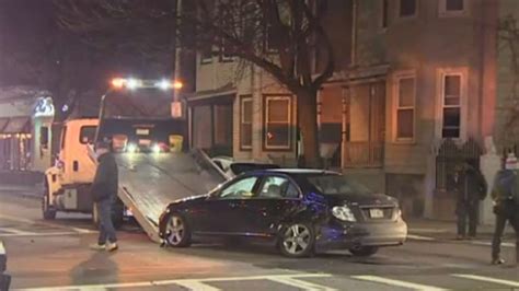 Officials investigating after Boston police car involved in crash ...