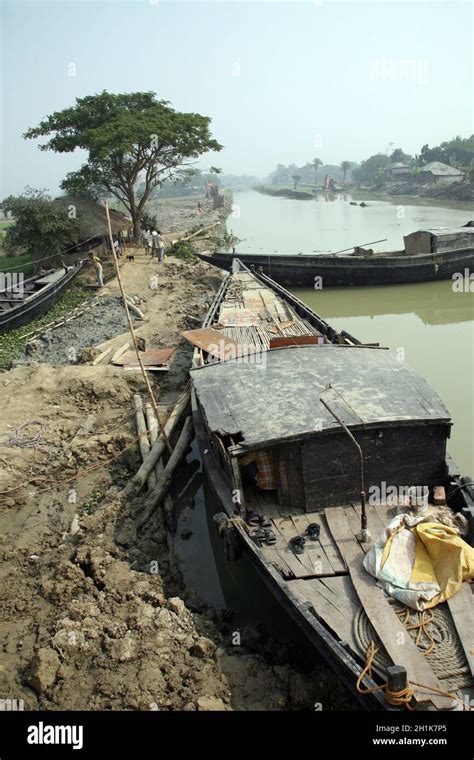 Traditional fishing boat in the delta of the Ganges River in Sundarbans ...