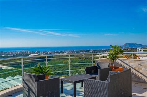 Premium Photo | A balcony with a view of the ocean and the sea.