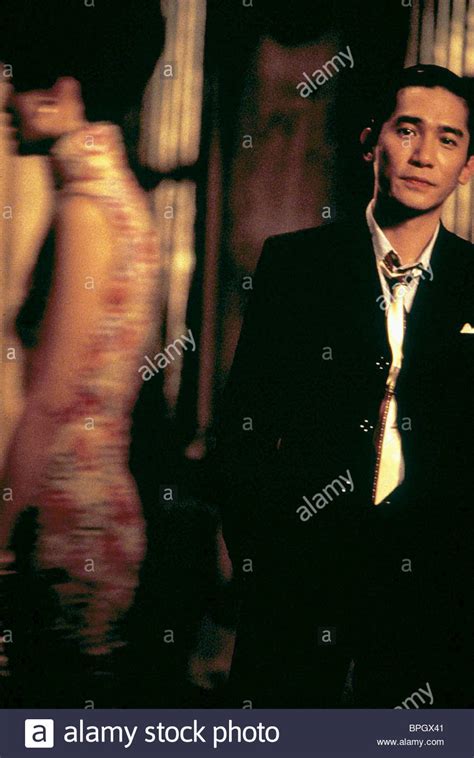 MAGGIE CHEUNG & TONY LEUNG IN THE MOOD FOR LOVE (2000 Stock Photo, Royalty Free Image: 31104529 ...