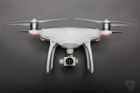 DJI's revolutionary Phantom 4 drone can dodge obstacles and track ...