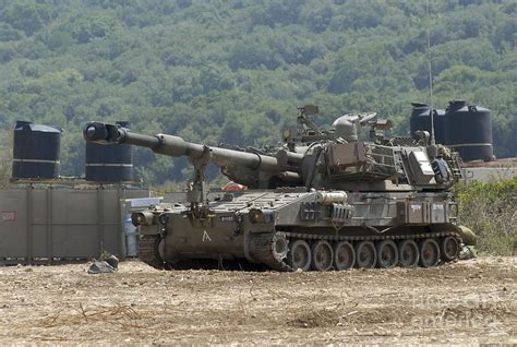 An M109 Self-propelled Howitzer Photograph by Andrew Chittock