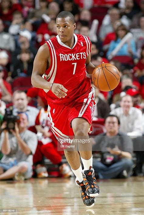 Kyle Lowry of the Houston Rockets drives the ball up court during the ...