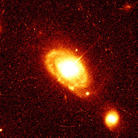 This image shows quasar PG 0052+251, which is 1.4 thousand million light-years from Earth, at ...