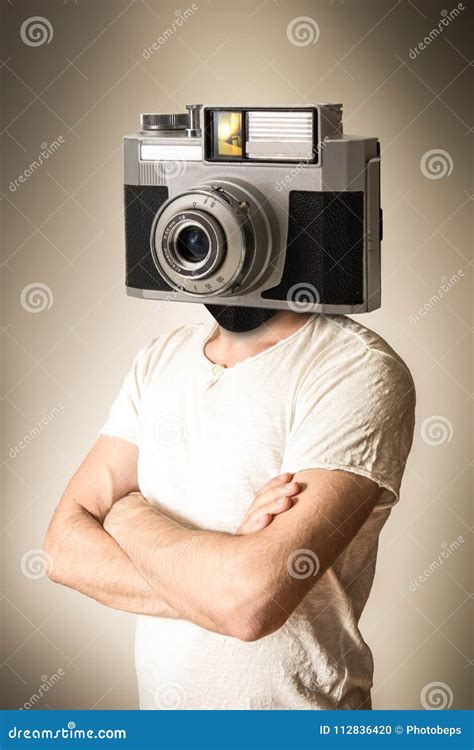 Man with a camera head stock photo. Image of photographer - 112836420