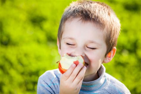 34251869 - happy kid eating fruits - The Dallas Morning News Charities ...