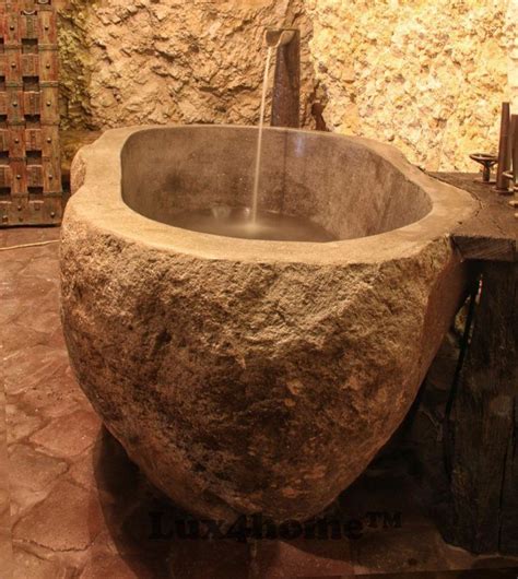 20 Bathroom Designs With Stunning Stone Tubs