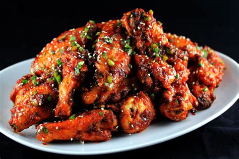 Sweet and Spicy Garlic Ginger Chicken Wings | CarnalDish