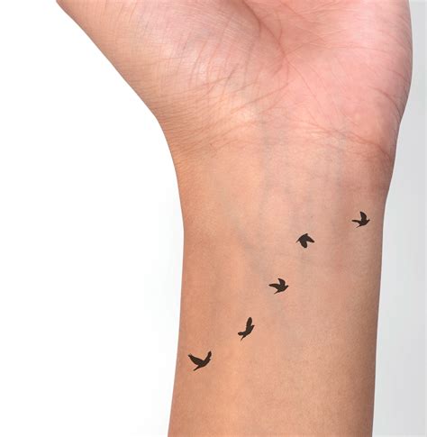 Realistic Flying Bird Tattoo