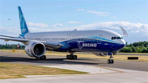 Boeing's new 777X extends its folding wingtips to complete first flight ...