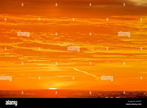 Calgary skyline at sunrise Stock Photo - Alamy