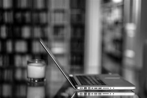 Macbook Pro on Grayscale Photography · Free Stock Photo