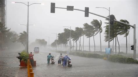 Typhoon Mangkhut: Two dead as storm batters Philippines; residents take ...