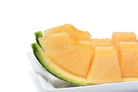 Sliced Melon in Pieces on a White Plate . Stock Image - Image of food, refreshment: 110806465