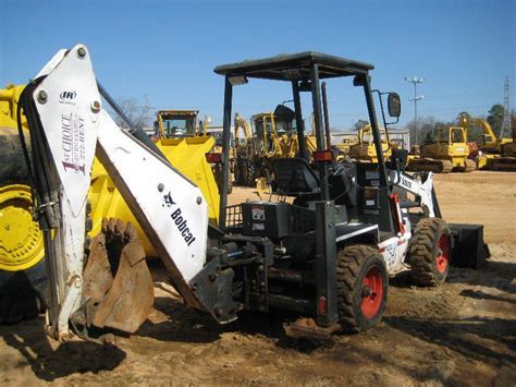 BOBCAT B250T LOADER BACKHOE - J.M. Wood Auction Company, Inc.