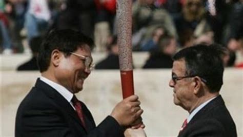 Olympic torch relay celebrated amid high security