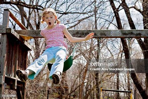 28 Kid Jumping Off Swing Stock Photos, High-Res Pictures, and Images ...