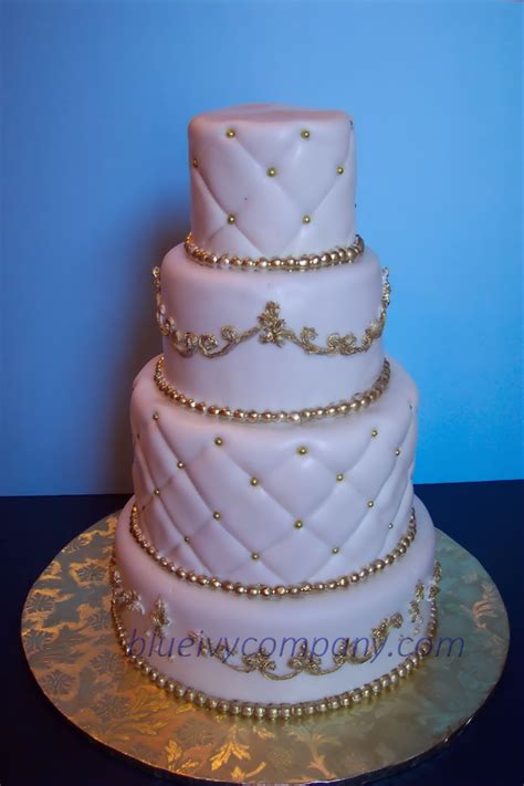 White & Gold Wedding Cake - CakeCentral.com