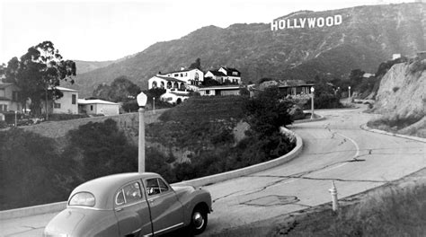 The view of the Hollywood sign from Deronda Drive in 1950, after the LAND part was removed ...