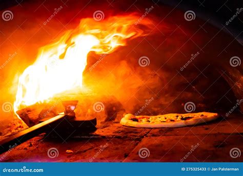 Homemade: Pizza in a Hot Wood Burning Oven. Stock Image - Image of ...