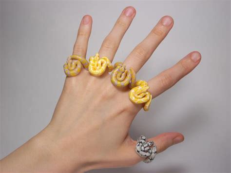 These Cute Animal Rings Hug Your Fingers