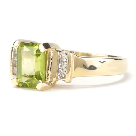 Emerald Cut Peridot and Diamond Ring in Yellow Gold | New York Jewelers Chicago