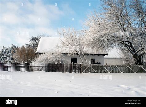 Winter village in forest Stock Photo - Alamy