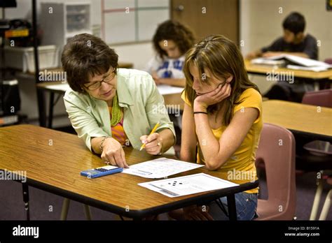 A special education teacher in a Southern California middle school Stock Photo: 17941878 - Alamy