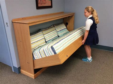 The Standard Bed Mechanism (hinged leg) is used to build a cabinet bed with two hinged wooden ...