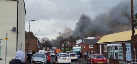 Major incident declared after large fire hits Manchester warehouse ...