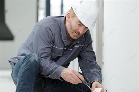 An Electrician Technician At Work Photo Background And Picture For Free Download - Pngtree