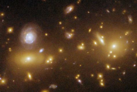 Hubble Space Telescope Observes at Least Two Galaxy Clusters Merging 8 Billion Light-Years Away ...