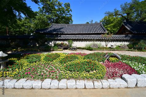 Stone road and flower garden at Gyeonggijeon Hall in Jeonju Korean ...