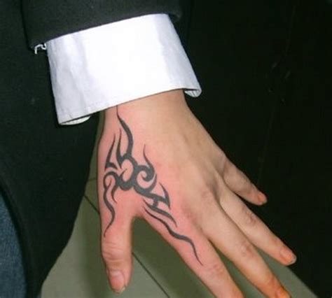 Hand Tattoos for Men | Tattoo Ideas Mag