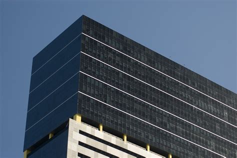 Free Image of Top Part of Architectural Large Office Building | Freebie.Photography