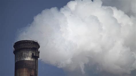 Pollution of the atmosphere . The smoke comes from the chimney Stock ...