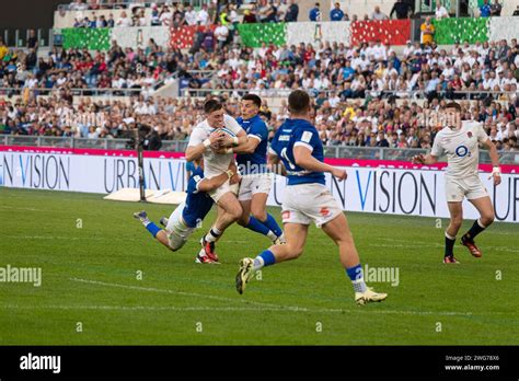 Rome, Italy, 3 feb 2024. Italy vs England, Rugby Six Nations, Tommy Freeman (ENG) running action ...