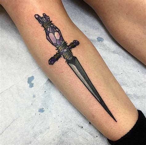 50 Amazing Sword, Dagger, and Knife Tattoo Designs - TattooBlend