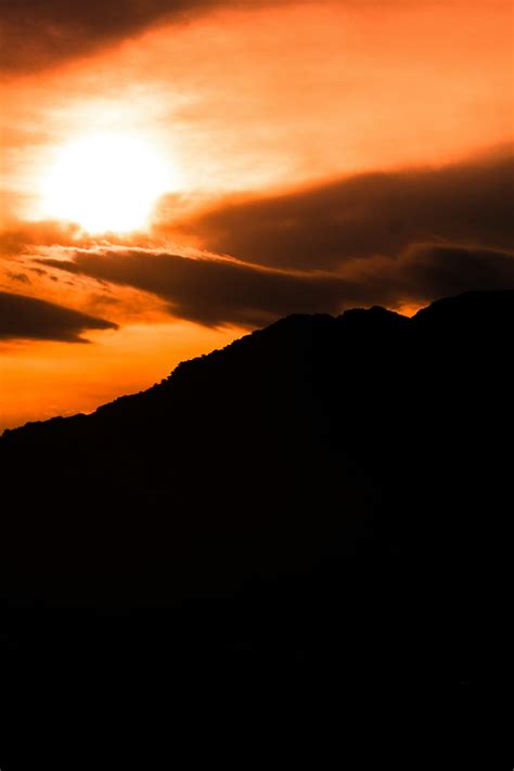 Silhouette of Mountain during Sunset · Free Stock Photo