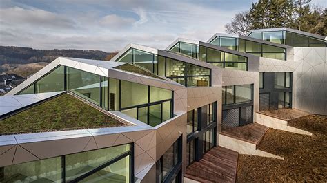 Sleek multi-family housing complex unfolds in Luxembourg - Curbed