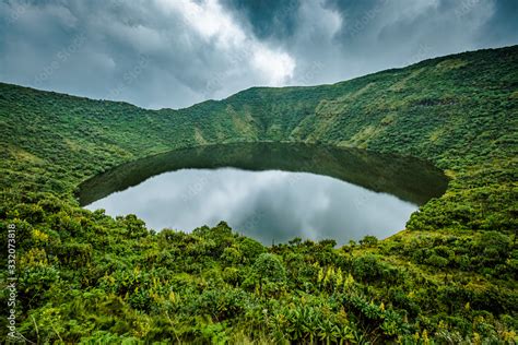 Crater lake on Mount Bisoke volcano, Rwanda Stock Photo | Adobe Stock